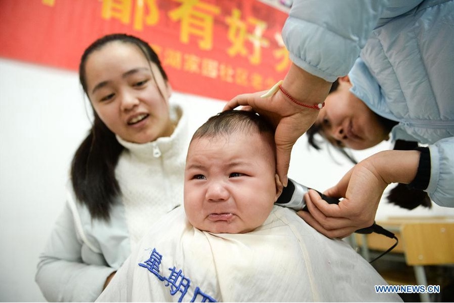 Chinese people cut hair to mark 